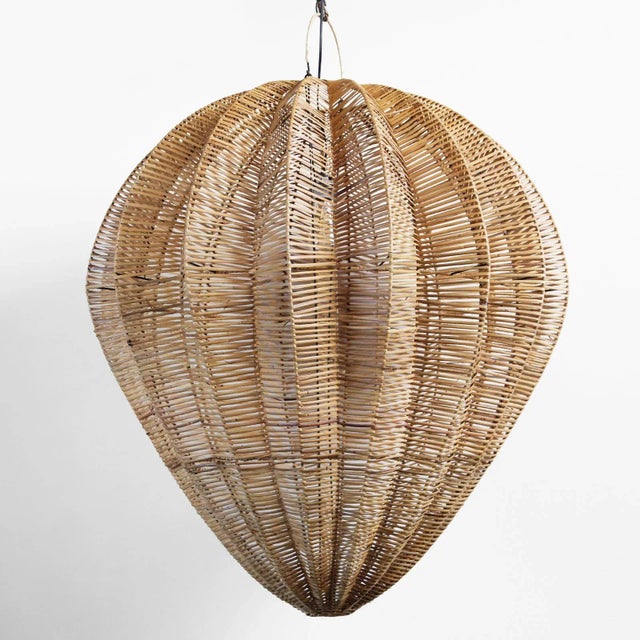Honey stained rattan starfruit large lantern. Beautiful natural material and organic shape. Each lantern may have slight...