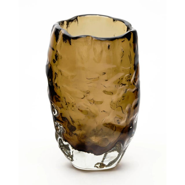 Single vase from the island of Murano outside of Venice, Italy. This piece is hand blown in a tobacco color glass. The...