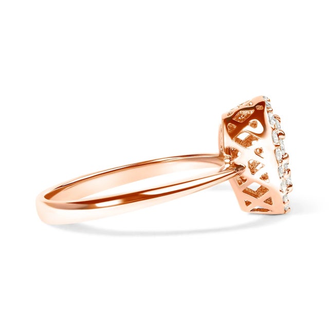 Captivate the heart with this enchanting 10K rose gold promise ring, exquisitely crafted to symbolize love's true promise....