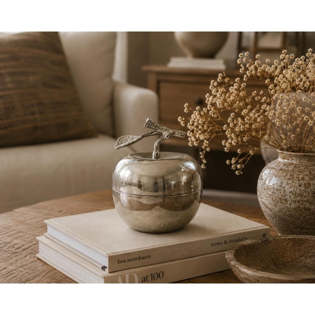 This elegant vintage silver plated apple trinket box is both decorative and functional. Crafted in the shape of a...