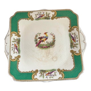 Royal Crown Staffordshire Decorative Plate. Vibrant Bird Motif With Ornate Gilt Scrollwork. Mid 20 Th Century. “ Fancy Goods.” 10 1/2” X 11 1/2” For Sale