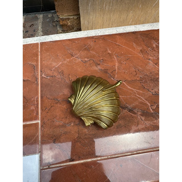 Up for consideration is a beautiful brass seashell compact with a latch and compartments inside. This would look lovely in...