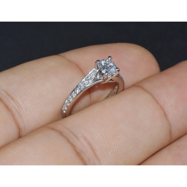 GIA Certified Natural 0.69CTS VVS E Diamond Solid 950 Platinum Designer Ring, size 4 For Sale - Image 9 of 11