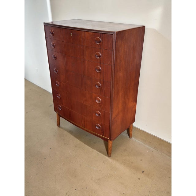 Beautiful Danish teak chest of drawers from the 1960s, designed by Kai Kristiansen for Feldballes Møbelfabrik. The piece...