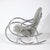 This striking mid-century modernist tubular chrome rocking chair, crafted in America circa 1970, is a study in innovative...