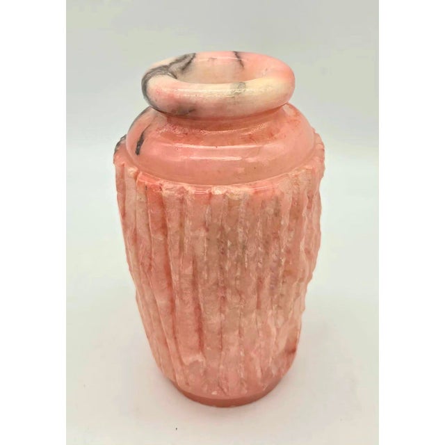Offered is a vintage carved and chiseled coral pink and dark-veined marble bud vase made in Italy, circa. the mid 1950s....