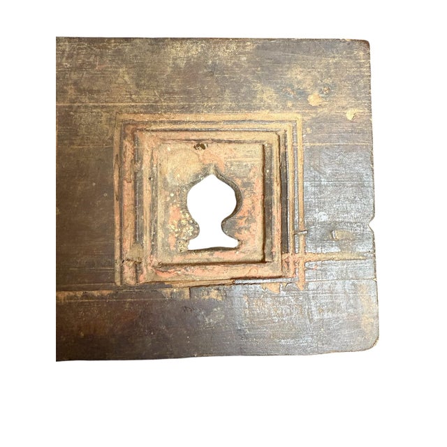A wooden frame used in Hindu households in India to showcase miniature figures of the Gods. Suitable for hanging or...