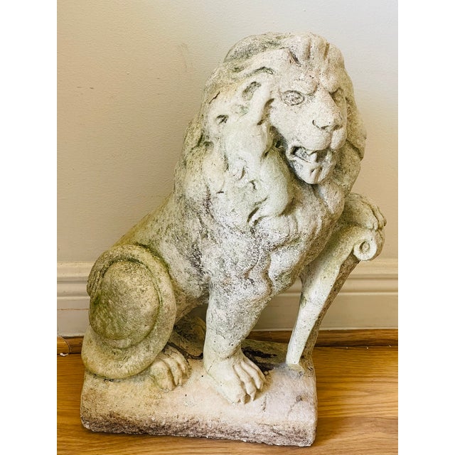 Antique concrete lion sculpture Garden decor.
