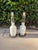Beautiful matching pair of vintage porcelain table lamps featuring romantic courting scenes, elegant gold-tone trim, and...