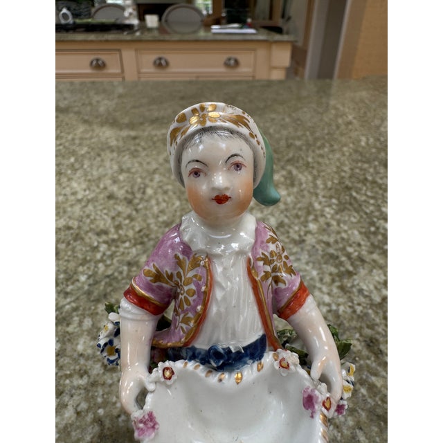 A charming porcelain figure. Mark unknown