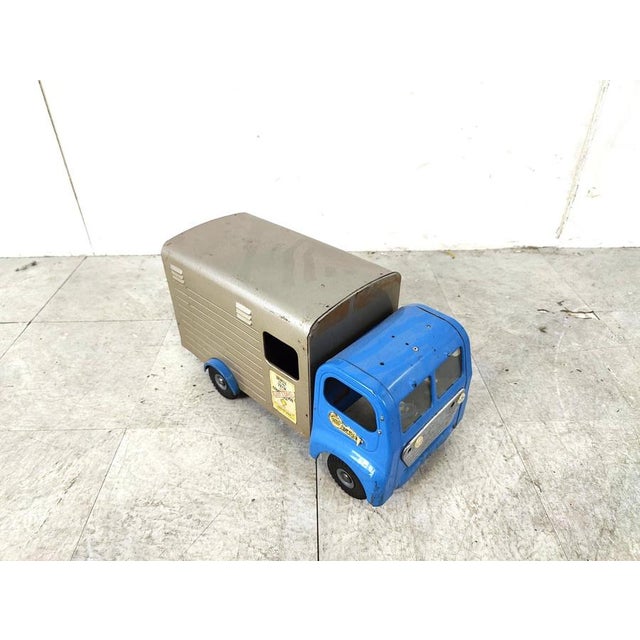 Vintage toy car from the english brand 'Tri-ang'. The charm is in the wear and tear of this item, it makes this little...