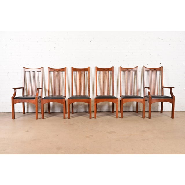 An exceptional set of six Mission or Arts & Crafts style high back spindle dining chairs By L. & J.G. Stickley USA, Circa...