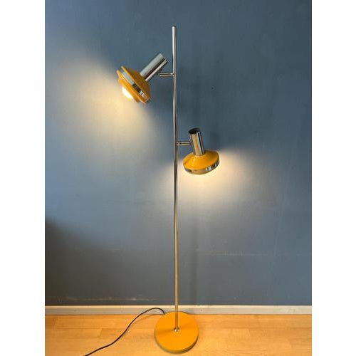 Very hip space age floor lamp by Hustadt Leuchten in ocre yellow colour. The design allows you to turn the spots in any...