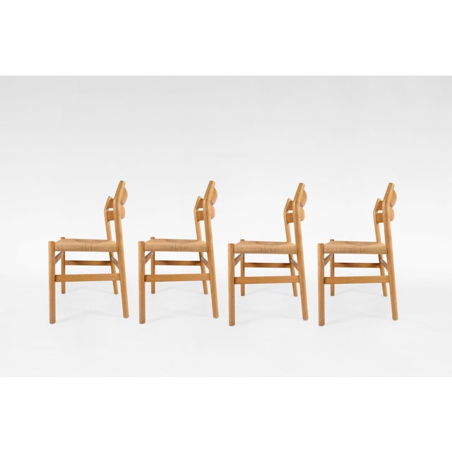 A vintage set of four bm1 dining chairs by børge mogensen for c.m. Madsen, crafted in denmark during the 1950s. Featuring...