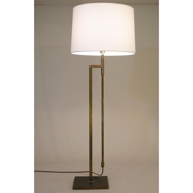 A minimal yet striking futuristic Mid Modern telescoping extension Bronzed Brass floor lamp designed and manufactured by...