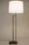A minimal yet striking futuristic Mid Modern telescoping extension Bronzed Brass floor lamp designed and manufactured by...