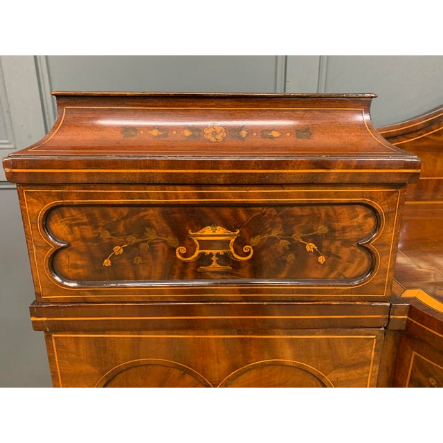 A very good George III period inlaid mahogany pedestal sideboard. Of generous proportions and of good construction in...