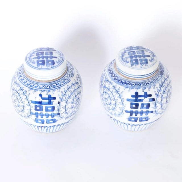 Originally a wish for a happy marriage the double happiness symbol is iconic, here we present a pair of lidded tea caddies...
