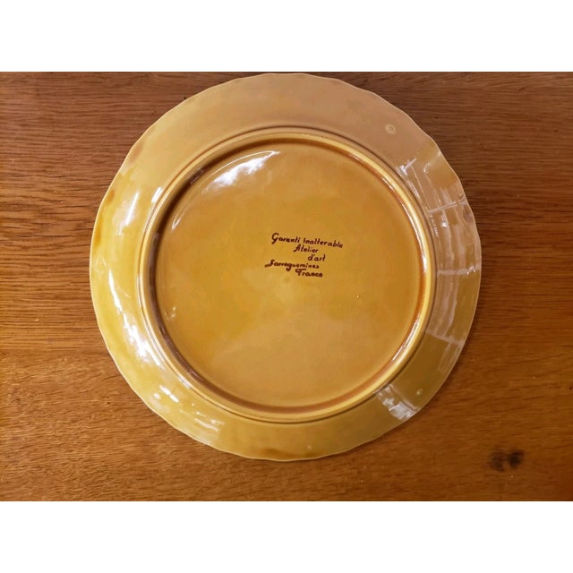 This is a Vintage Sarrequemines Ceramic Plate, French Atelier d'Art, Fish Motif #2. It measures 1" high and 10“ in...