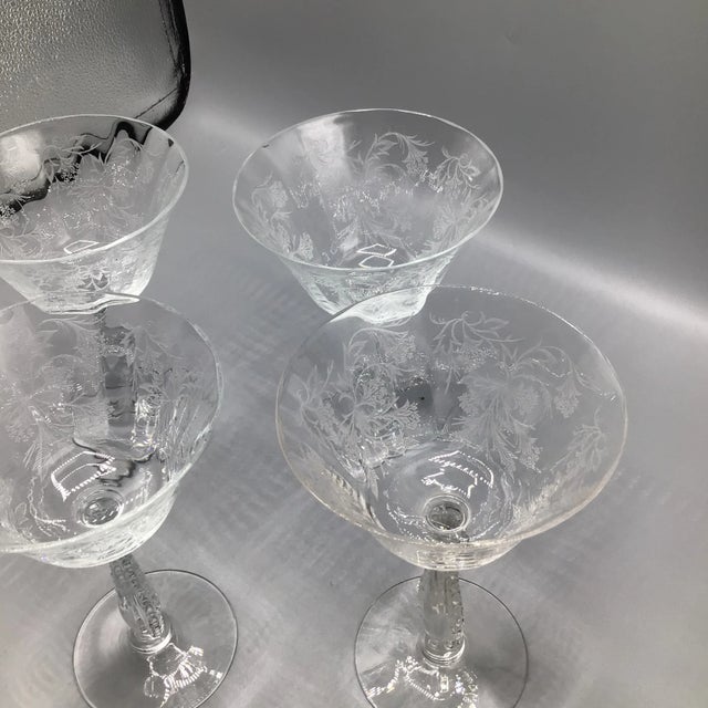 Another beautiful etched crystal tall champagne coupe by Fostoria. This pattern is called Heather with Fostoria etched on...