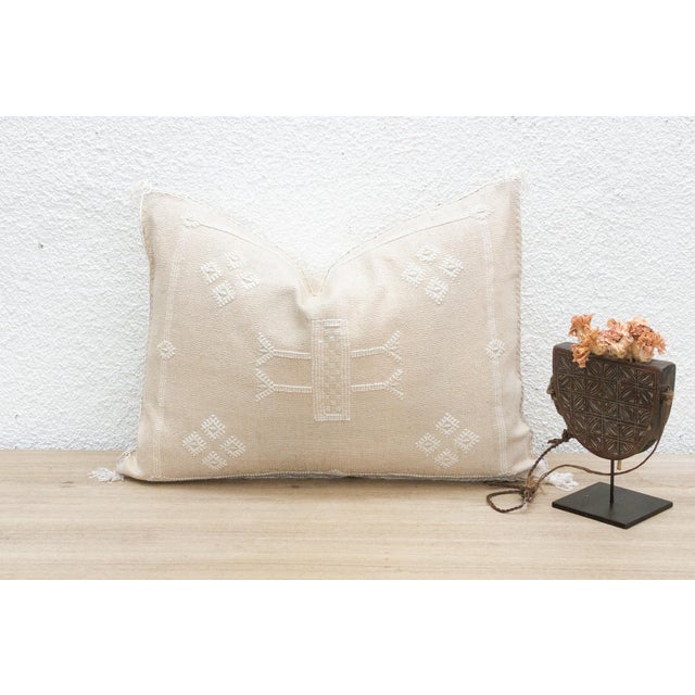 Introduce a touch of refined elegance with our handcrafted lumbar rectangular Moroccan cactus silk pillow. Woven from the...
