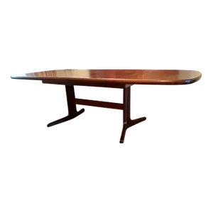 Late 20th Century Mid Century Modern Rosewood Trestle Base Dining Table With 2 Leaves.