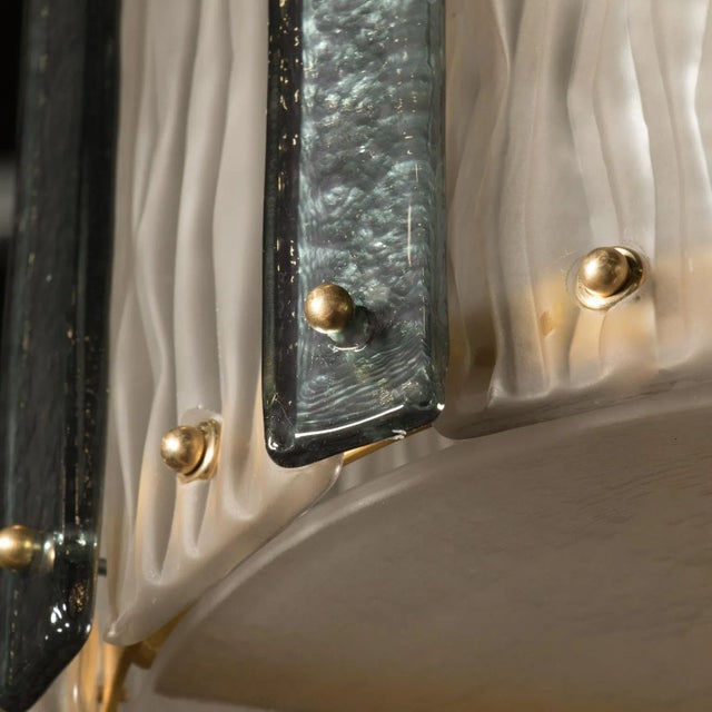 Slender cylindrical modern Murano glass fixture consists of long, slender bands of glass (piastra) suspended from internal...