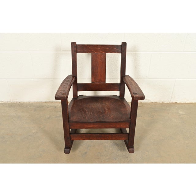 A rare and exceptional antique Mission or Arts & Crafts period child's rocking chair By Charles P. Limbert Co. USA, Circa...