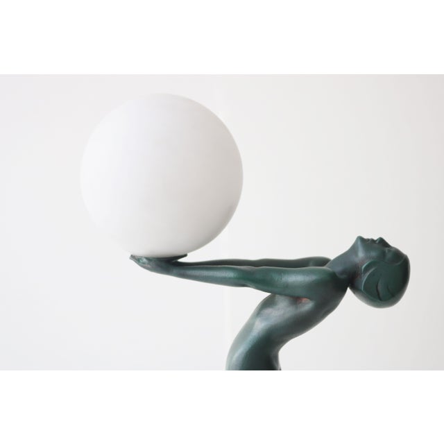 An exceptional original Art Deco table lamp, model “Lueur Lumineuse,” designed by Max Le Verrier and dating from circa...
