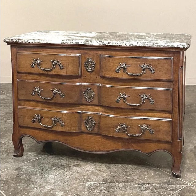 19th Century Country French Cherrywood Marble Top Commode combines the best of all worlds! Exuding a somewhat rustic look...