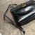 A 1990s Black Leather and Brass Shoulder Bag by Salvatore Ferragamo For Sale - Image 9 of 10