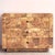 This dresser features a striking modern silhouette wrapped in faux burl wood laminate veneer, known for its unique,...