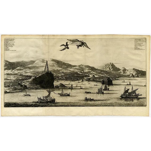 Rare Antique print, titled: 'Cangoxuma.' A stunning bird's eye view of the coastal city Cangoxuma (Kagoshima) in Japan. It...