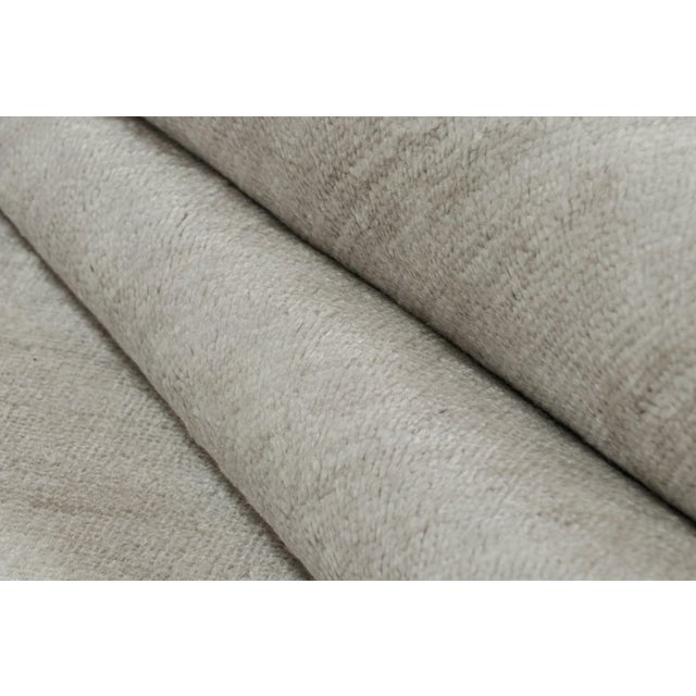 This contemporary 11x19 palace-sized rug is a grand new entry to Rug & Kilim’s Texture of Color Collection. Hand-knotted...