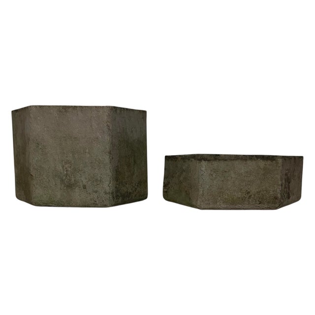 A set of two planters in the style of Willy Guhl. These date to the 1970s, and show ample signs of time and use. They are...