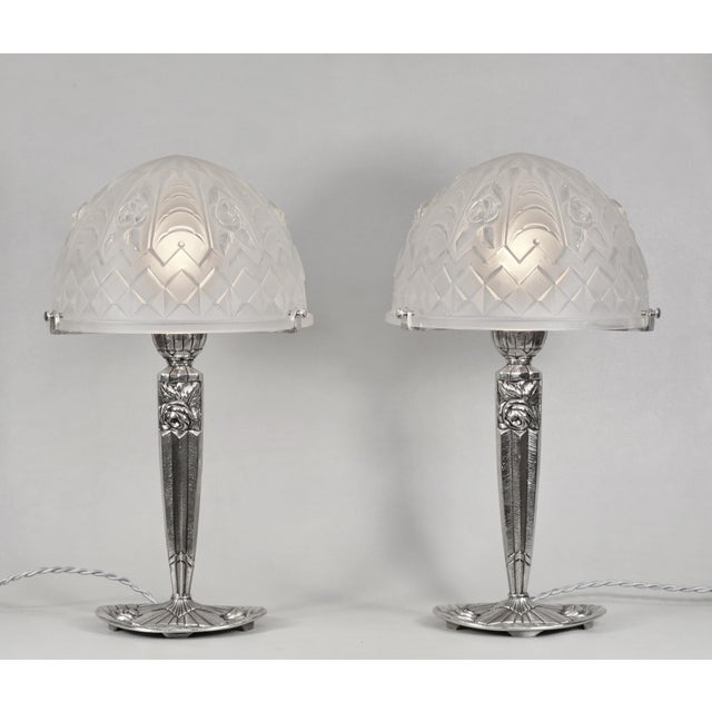 Paul Gilles A wonderful pair of French art deco lamps by Paul Gilles in nickel plated solid brass or bronze. Made around...