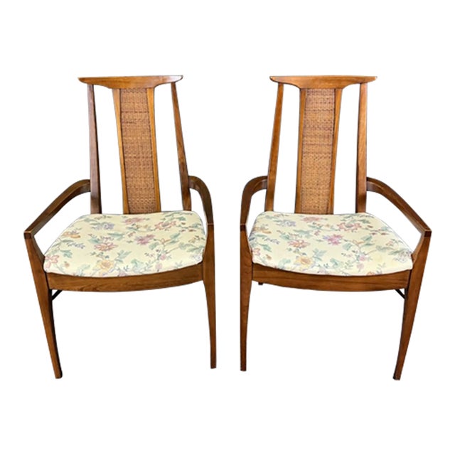 Pair of Mid-Century Modern Walnut Cane-Back Arm Chairs For Sale