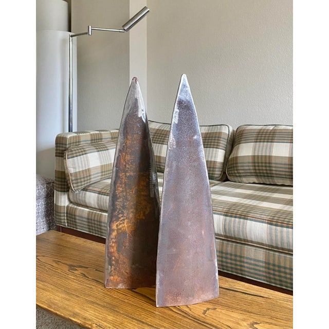 Industrial rusty steel table top “fin” form sculptures. .