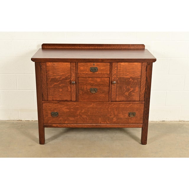 An exceptional antique Mission or Arts & Crafts period sideboard, credenza, buffet server, or bar cabinet By Lifetime...