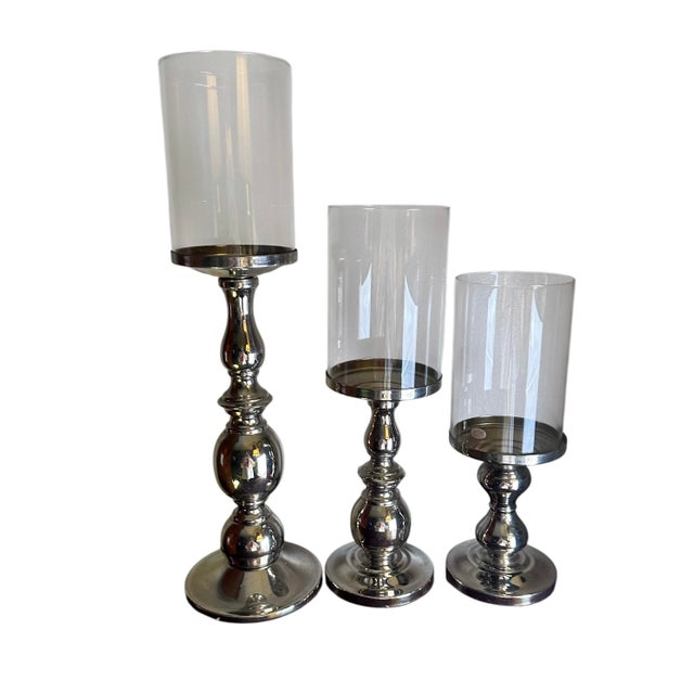 Three beautiful chrome plated candlestick holders with hurricane glass shades by Towle Smithersmiths. Hurricane candle...