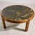 Round shaped coffee table with oak legs and artificial stone top from the 1980s. with some surface scratches, stains and...