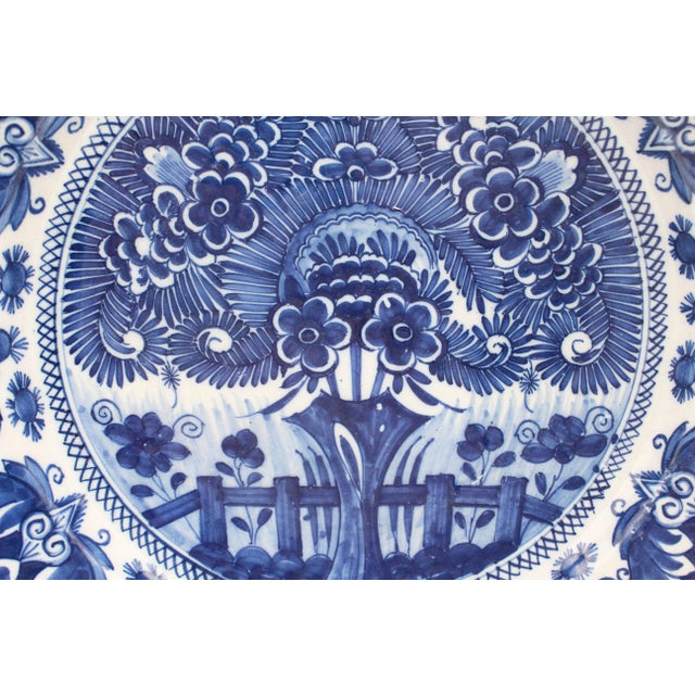 Mid-18th century Delft shaped large "Orange Tree" pattern charger, Dutch. Blue & white. Chippendale silver pattern shaped...