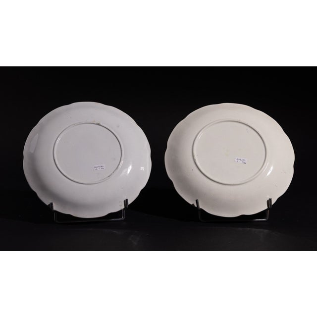 This pair of commemorative earthenware plates celebrates Queen Victoria’s Diamond Jubilee (1837–1897). One plate features...