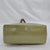 This sophisticated Louis Vuitton Reade GM handbag is a stunning example of the French luxury house's Monogram Vernis line....