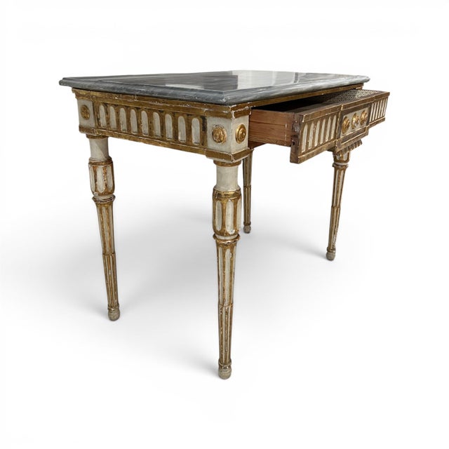 This elegant 18th-century Italian Louis XVI console table features a beautifully aged grey marble top above a single...