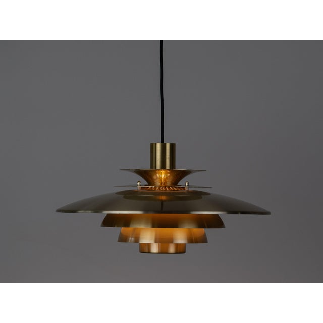 A beautiful vintage pendant lamp designed by danish designer kurt wiborg and manufactured by jeka. With its timeless form...