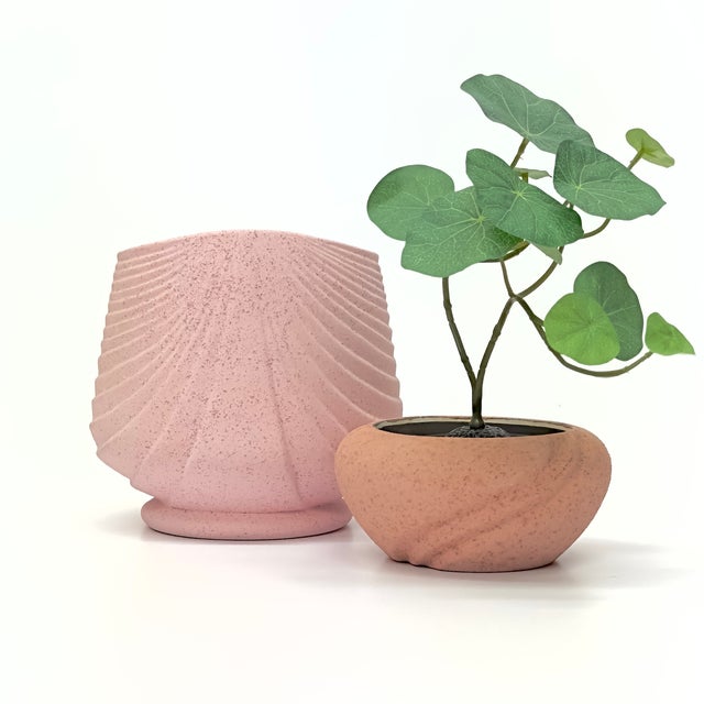 Blush pink matte ceramic planters, group of 2. A set of 1980s mixed blush pink matte flecked ceramic planters. Shortest:...