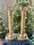 Styled as Corinthian columns, this pair of heavy brass candlestick holders are perfect for an entry table or mantel. From...