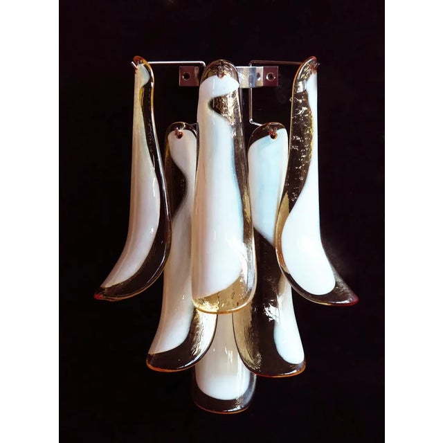 ORIGINAL MURANO GLASS PRODUCTS Italian Murano sconces/wall lights. The sconces has 6 caramel and lattimo glass petals (for...