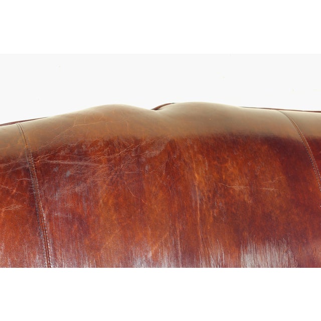 Vintage Art Deco Distressed Brown Leather Three-Seat Sofa With Mustache Back For Sale - Image 11 of 18